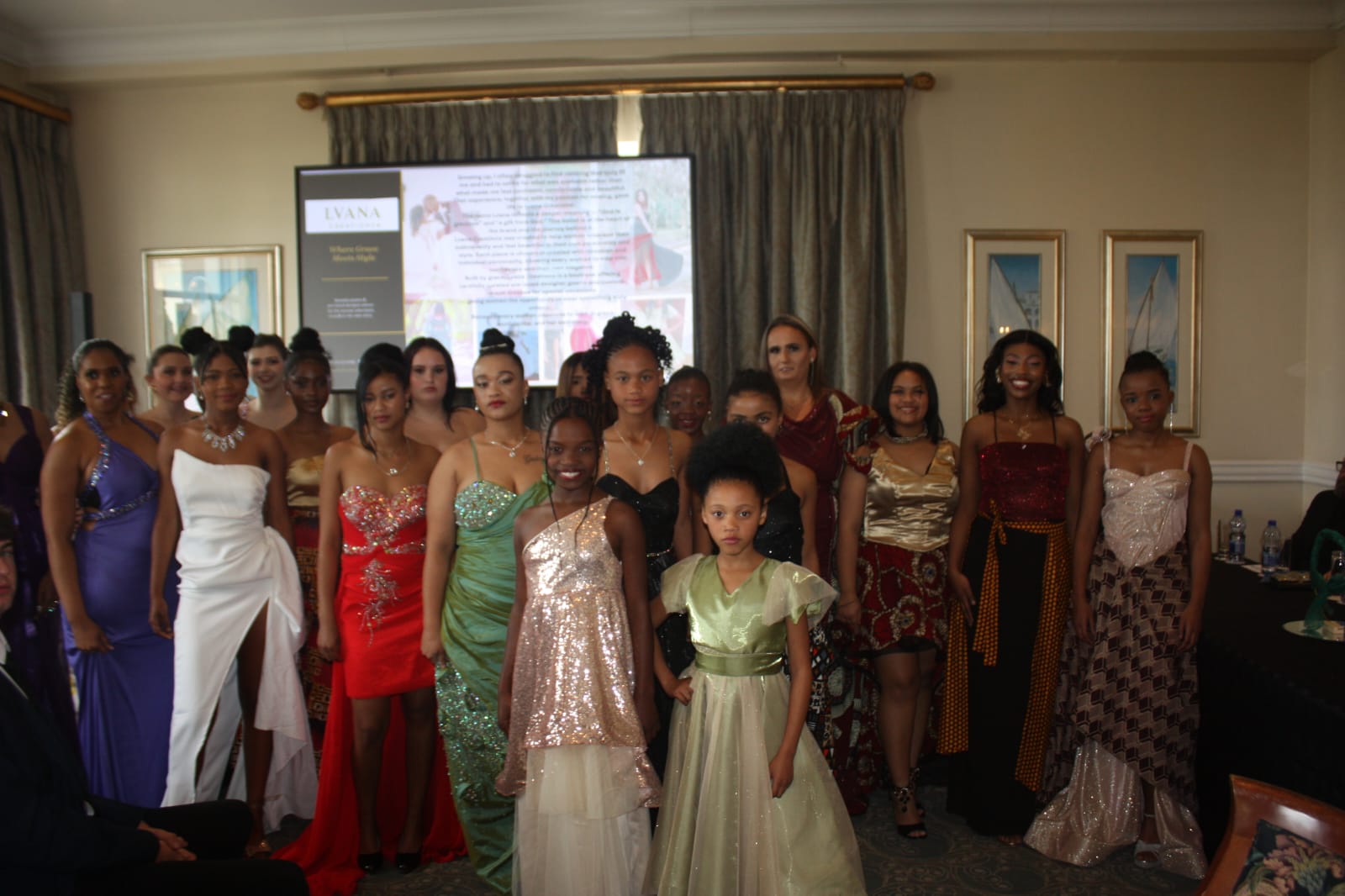 Model wearing a Lvana Creations gown on the runway